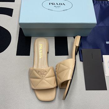 PRADA Quilted nappa leather sabots Nude