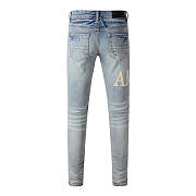 AMIRI Logo Distressed Skinny Jeans - 6