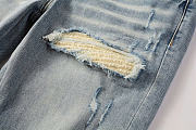 AMIRI Logo Distressed Skinny Jeans - 3