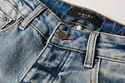 AMIRI Logo Distressed Skinny Jeans - 2